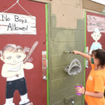 girl scouts painting restrooms